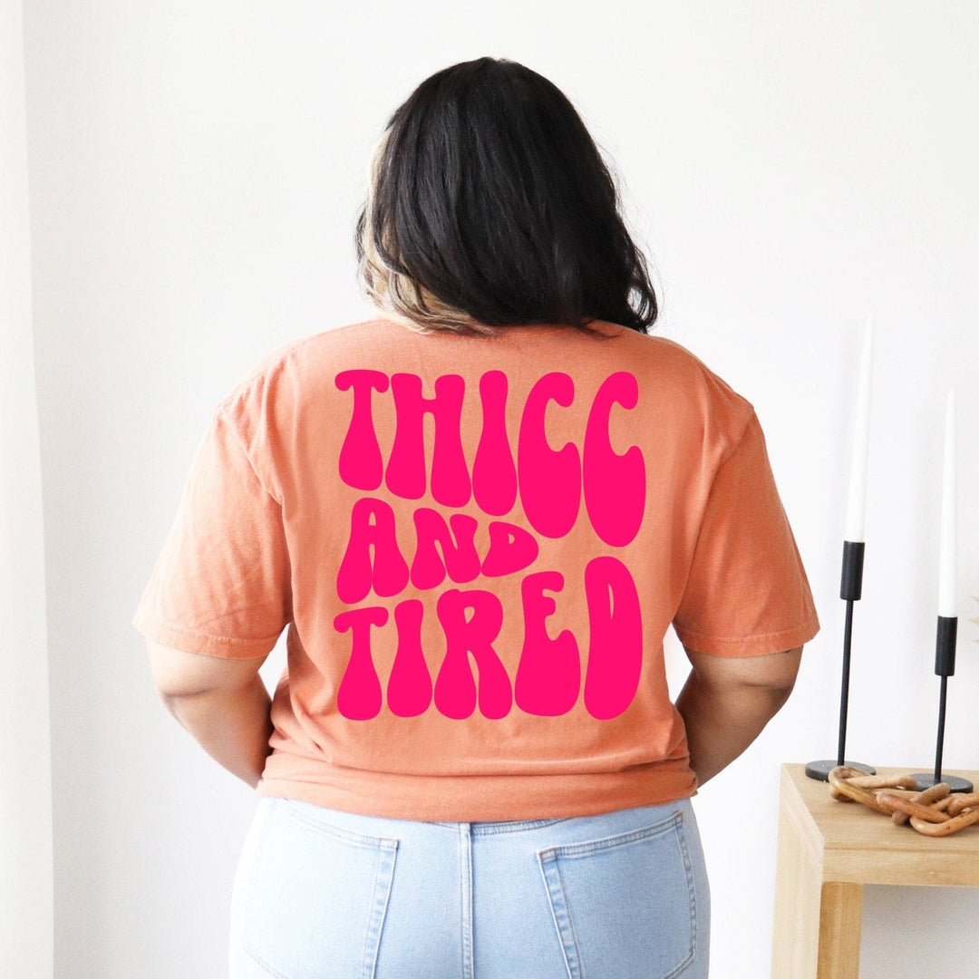 Thicc and Tired Tee - Terracotta with Neon Pink Print